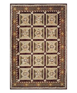 Hand tufted Panel Burgundy Wool Rug (36 X 56) (BurgundyPattern OrientalMeasures 0.5 inch thickTip We recommend the use of a non skid pad to keep the rug in place on smooth surfaces.All rug sizes are approximate. Due to the difference of monitor colors, 