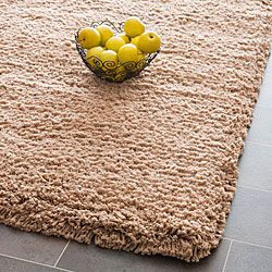 Plush Super Dense Hand woven Taupe Premium Shag Rug (96 X 136) (BeigePattern ShagMeasures 1.5 inches thickTip We recommend the use of a non skid pad to keep the rug in place on smooth surfaces.All rug sizes are approximate. Due to the difference of moni