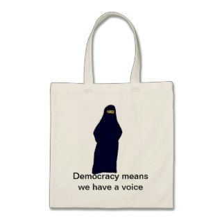 women in abaya color, Democracy means we have aCanvas Bags