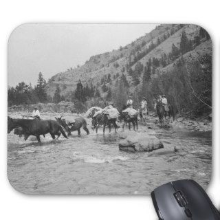 Driving pack mules across a river mousepads