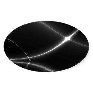 White lines of light against black oval sticker