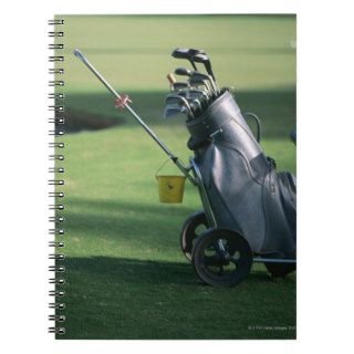 Golf clubs and golf bag spiral note book