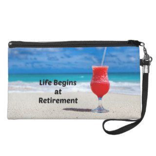 Life Begins at Retirement, frosty drink on beach Wristlet Clutches