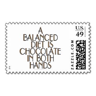 A balanced diet is chocolate in both hands postage stamp