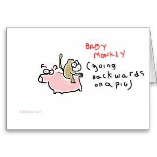 Baby Monkey (riding backwards on a pig) Greeting Card