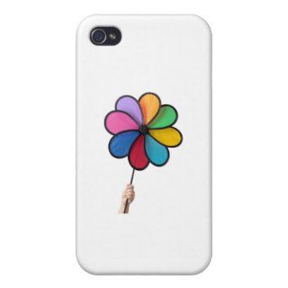 Child hand holding a pinwheel covers for iPhone 4