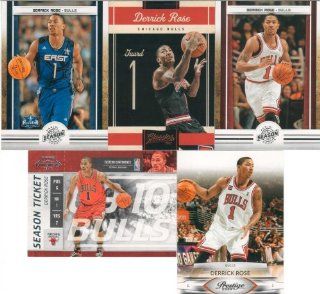 Derrick Rose 5 Card Gift Lot Containing One Each of His 2010 2011 Panini Season Update Card #76 and #188, Playoff Contenders Season Ticket and Panini Classics, and His 2009 Prestige Mint Condition Chicago Bulls Cards. Nice Mix Picturing Him in His Red, Whi