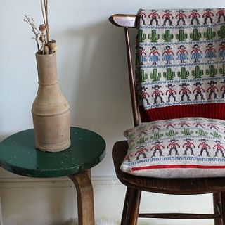 knitted lambswool cowboy and cactus cushion by sally nencini