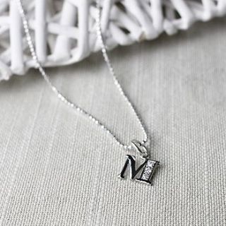 your initial as a charm necklace by tales from the earth