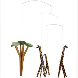 giraffes on the savannah by drift living