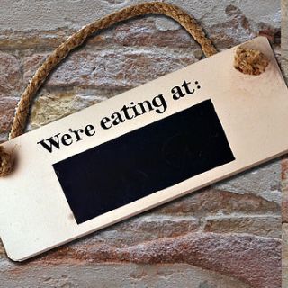 'we're eating at…' chalk board sign by angelic hen