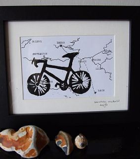framed bike print on hand drawn bespoke map by something wonderful design