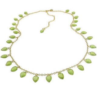 handmade peridot leaf necklace in 18ct gold by lilia nash jewellery