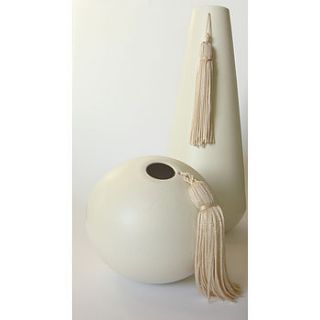 handmade ceramic vases with tassel detail by lauren denney