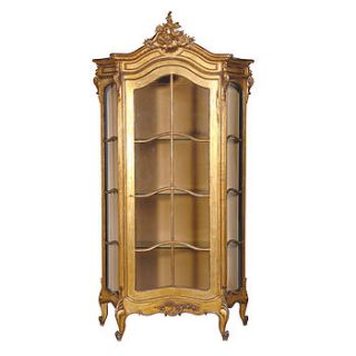gold showcase cabinet by out there interiors