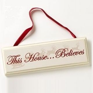 this house believes christmas hanging sign by sleepyheads