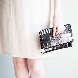 black fold over clutch by red ruby rouge