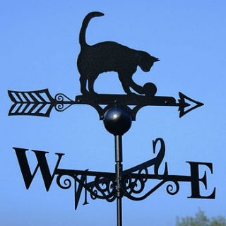 cat and ball weathervane by the orchard