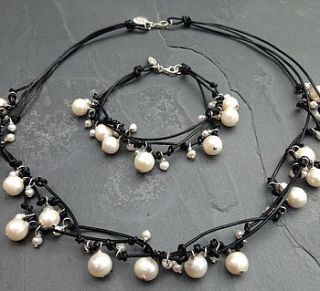 black three stranded leather pearl set by elispanning