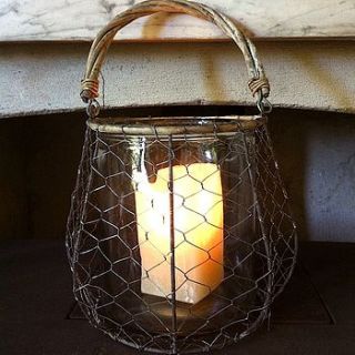 large wire and glass lantern by the forest & co