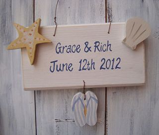 personalised beach wedding sign by giddy weddings