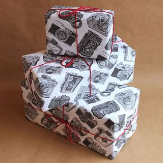 five sheets of 'cameras wrapping paper' by ros shiers