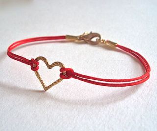 red cord heart bracelet by a box for my treasure