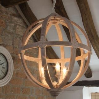 large round wood chandelier by cowshed interiors
