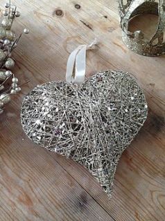 gold glitter hanging heart by the hiding place