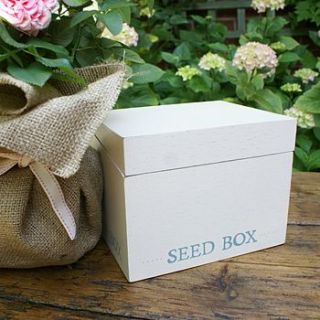 wooden seed box by the chic country home