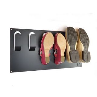 stylish wall mounted shoe rack by the metal house