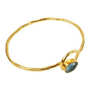 gold gem bangle with flourite stone by flora bee