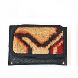 handmade leather and vintage carpet purse by lion house handbags