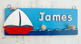 personalised peg plaques by dream scene children's gifts