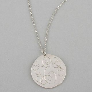 silver 'yes' coin necklace by lindsay pearson