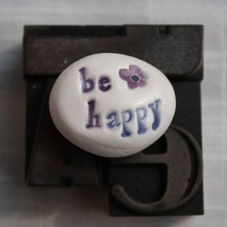 porcelain 'be happy' stone by corn kist ceramics