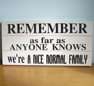 'we're a nice normal family' sign by hope and willow