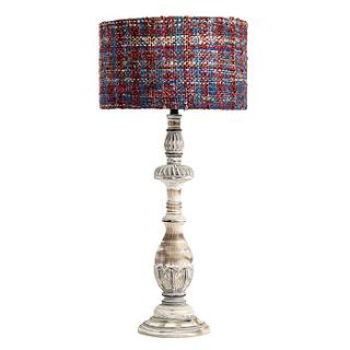 carved wood table lamp with colourful shade by out there interiors