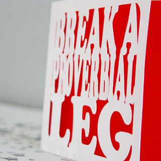 'break a leg' card by whole in the middle