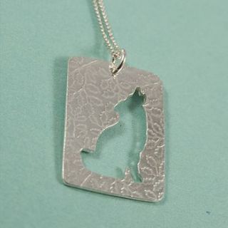 sterling silver wolf silhouette pendant by fragment designs