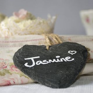 set of four slate heart place markers by wedding in a teacup