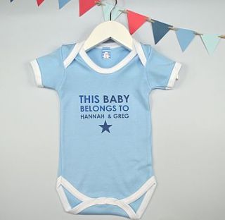 personalised boy's belongs to baby grow by tillie mint