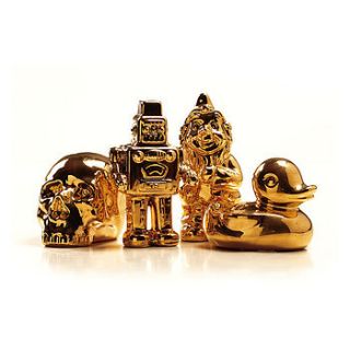 gold plated figurine by out there interiors