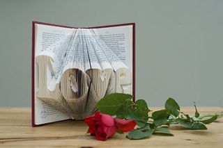 'love' folded book decoration by the folded page