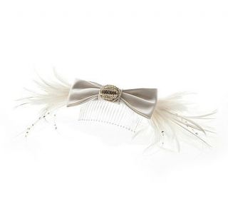 bow and feather headpiece by natascia fileppi millinery