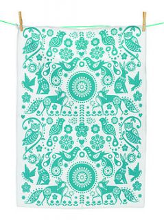 folklore turquoise print tea towel by the contemporary home