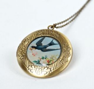 diving swallow antiqued brass locket by artysmarty