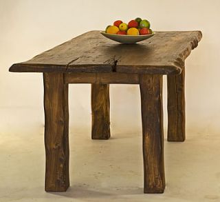 large rustic handmade wooden dining table by kwetu