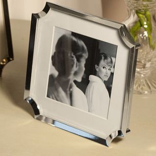silver picture frame with curved corners by jodie byrne