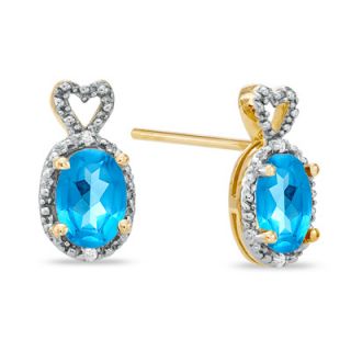 Oval Blue Topaz and Diamond Accent Heart Top Frame Stud Earrings in